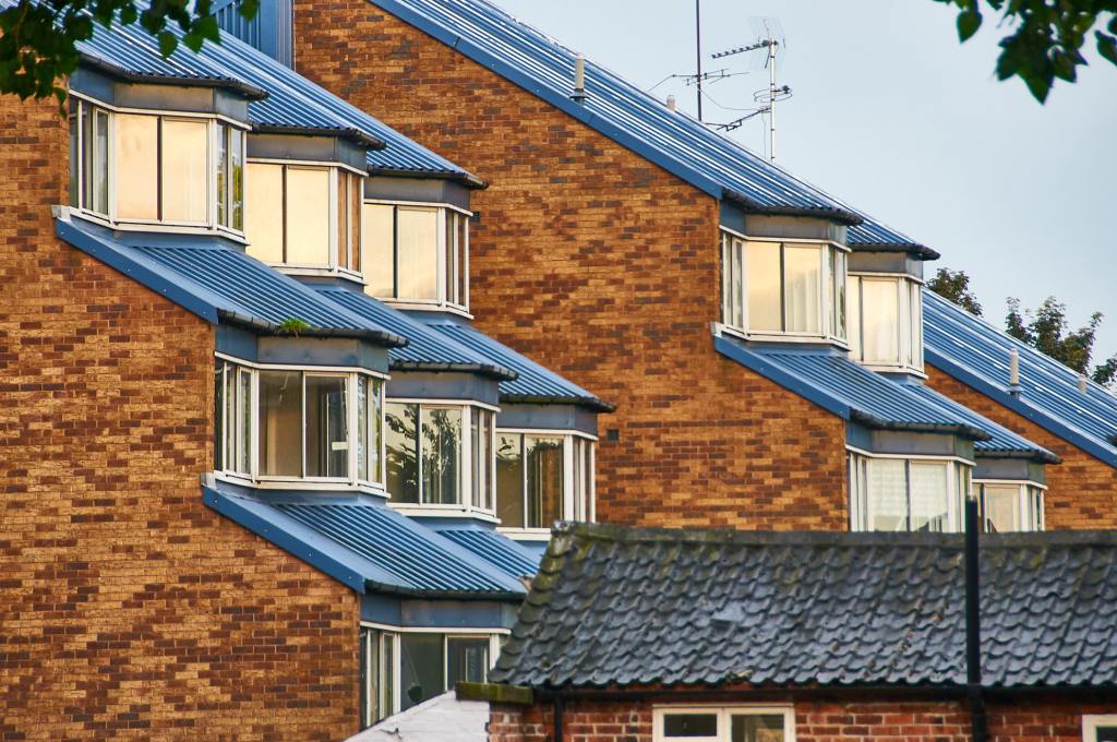 Now-demolished social housing, perhaps unsustainable due to flood risk, but in a beautiful riveride setting.