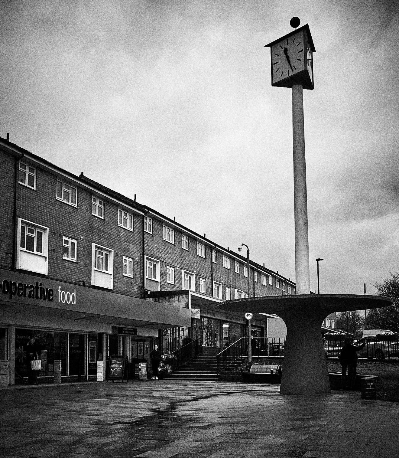 The shops at Prince Charles Avenue and the Lonnie Wilsoncroft memorial. I hope to revisit in more clement weather. The clock suggests a Festival of Britain influence. Beats Poundbury any day.